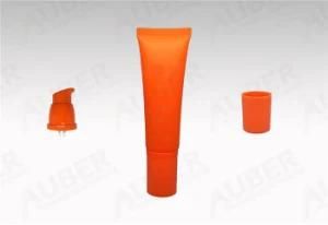 Orange Airless Pump Tube in Dia 30 mm with Screw on Caps for Hand Cream