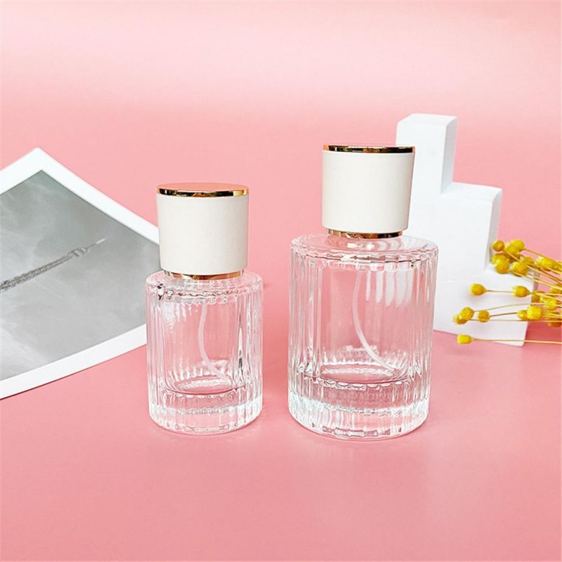 2022 New Design 30ml 50ml Luxury Glass Perfume Bottle Cylinder Shape Clear Spray Glass Screw Bottle