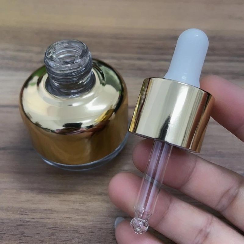 Good Quality 30ml Transparent Glass Dropper Bottle with Gold Aluminum Shoulder Cover