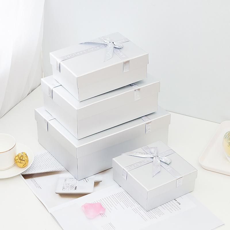 Wholsale Customized Logo Ivory Paper 350g with Matte Laminate Ribbon Hand Bag Gift Box Set