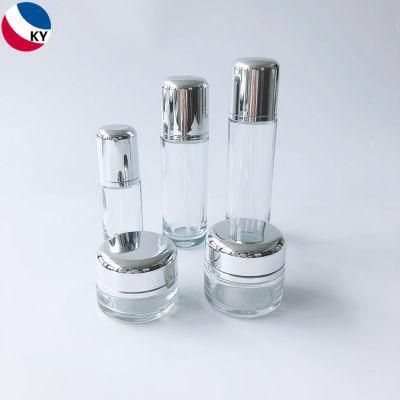 Luxury Round Bottom 30g 50g 30ml 50ml 100ml Cream Jar Round Cap Clear Glass Pump Bottle with Silver Pump