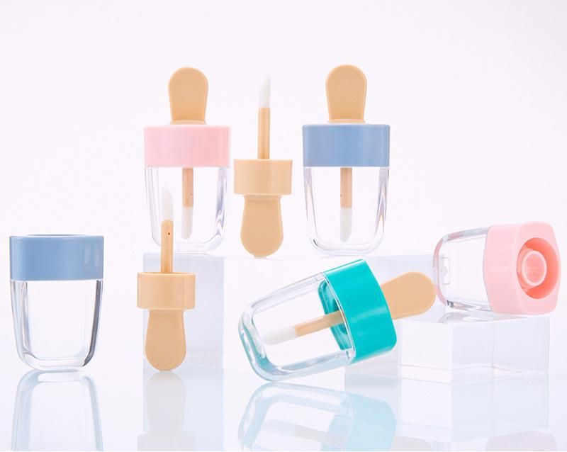 Custom Logo 8ml Transparent Empty Luxury Plastic Ice Cream Cosmetic Balm Lipstick Lip Gloss Containers Tube with Brush Wand