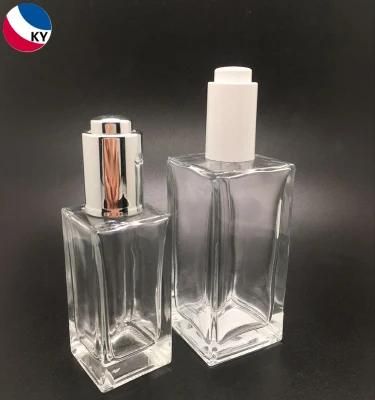 Cosmetic Packaging Body Facial Essential Oil 50ml 100ml Clear Square Glass Bottle with Push Button Dropper