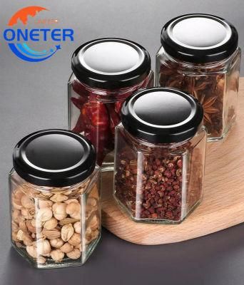 Wholesale Hexagon Polygon Canister Glass Bottle Jam Chili Sauce Pickle Nut Glass Jar with Lug Lid and Stickers