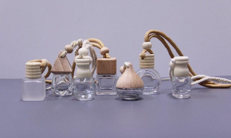 Low MOQ 5ml 10ml Car Air Freshener Perfume Bottle Empty Refillable Hanging Essential Oil Diffuser Bottle with Wooden Cap