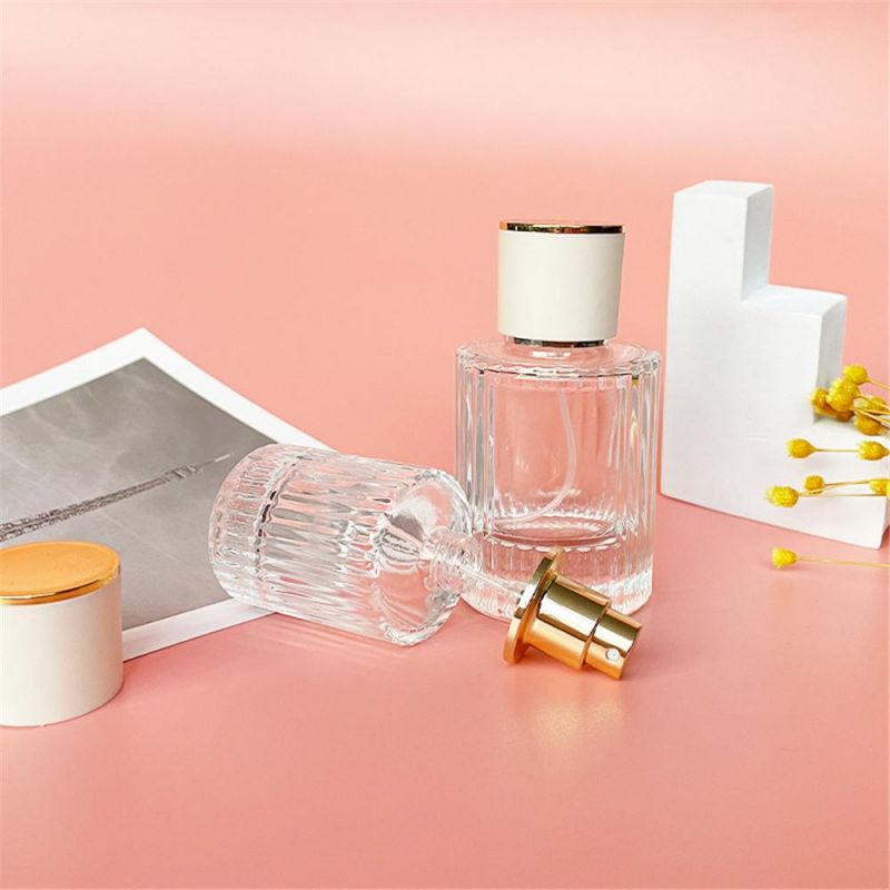 2022 New Design 30ml 50ml Luxury Glass Perfume Bottle Cylinder Shape Clear Spray Glass Screw Bottle