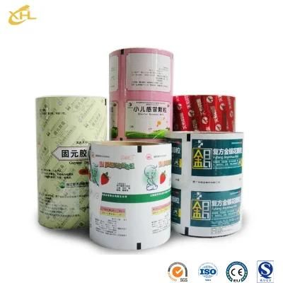 Xiaohuli Package China Printed Food Bags Manufacturing Vacuum Bags Flexo Printing Plastic Film Roll for Candy Food Packaging