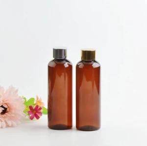 200ml Pet Plastic Round Shoulder Amber Cosmetic Shampoo Lotion Packing Bottle with Gold and Silver Screw Cap