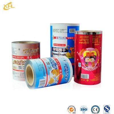 Xiaohuli Package China Food Bottle Packaging Factory Wholesale Plastic Packaging Bag Flexo Printing Packing Roll for Candy Food Packaging