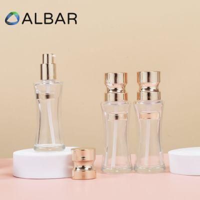 Cylinder Round Cosmetics Glass Bottles in Clear or Frosted Silver and Light Gold Caps
