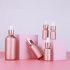 30ml Eco Friendly Matte Rose Golden Pink Luxury Round Oil Serum Glass Bottle for Face Care Skin Care Packing Hair Oil Container