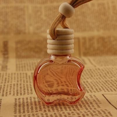 Manufacture 5ml 6ml 7ml 8ml 10ml Hanging Empty Apple Shape Car Diffuser Perfume Bottle Wtih Wooden Screw Cap