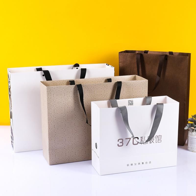 China Factory Wholesale Surface Handling Customized Printed Kraft Paper Bags with Handles