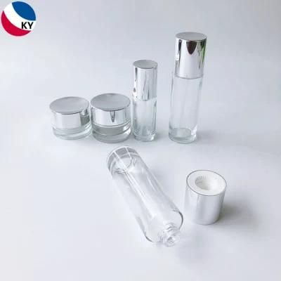 Luxury Cosmetic Packaging Sets Cylinder 30g 50g 30ml 50ml 100ml Cream Jar Clear Glass Pump Bottle with Silver Pump