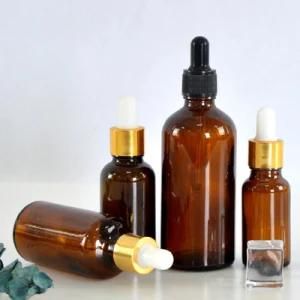 Wholesale 15ml 20ml 30ml 50ml 100ml Amber Glass Essential Oil Bottles with Plastic Tamper Evident Caps and Drip Plugs