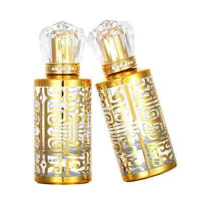 Cylindrical Electroplated Golden 50ml Glass Perfume Bottle Luxury Spray Bottle