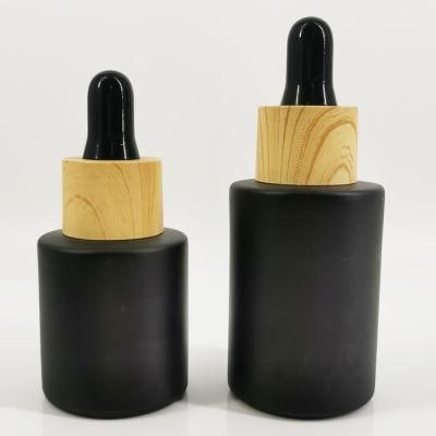 50ml 60ml Black Essential Oil Glass Bottle with Wood Grain Dropper Cap