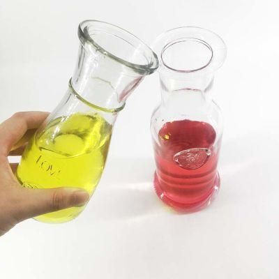 300ml 500m Glass Beverage Carafe with Narrow Neck Design in Clear