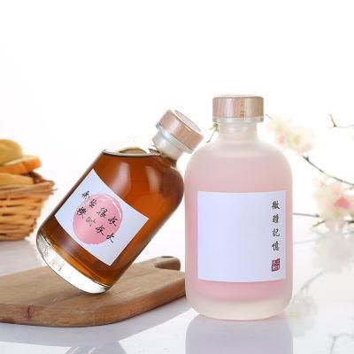 High Quality Frosted 100ml 250ml 375ml 500ml Beverage Liquor Gin Glass Bottle with Wood Cork