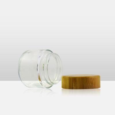 Wholesale 1g 3G 5g 2oz 4oz Luxury Clear Straight Sided Bamboo Cap Cosmetic Food Wax Packaging Glass Jar with Bamboo Child Proof Lid