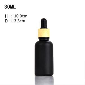 Hot Sale 5ml 10ml 15ml 20ml 30ml 50ml 100ml Matte Frosted Black Essential Oil Glass Bottle with Bamboo Dropper Cap