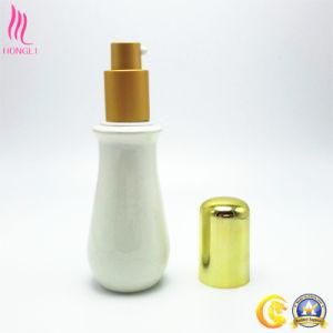 White Colored Glass Bottle with Golden Sprayer and Cap