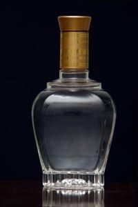 Clear Decorative X. O. Glass Bottle