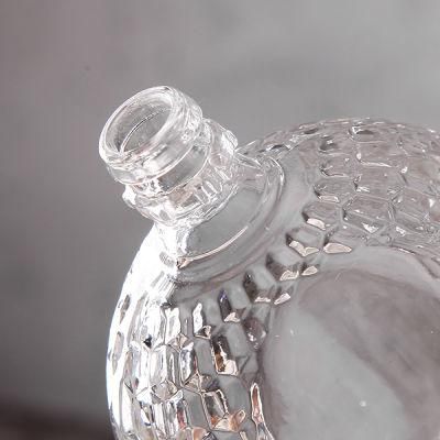 Transparent Embossed Clear Mini Liquor Glass Bottle with Golden Cap