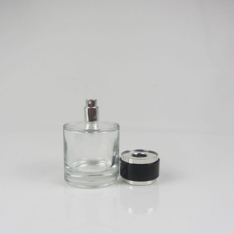 China Wholesale Logo Custom Mini Round Perfume Bottle with Cap