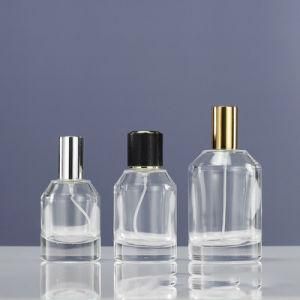 Newest Design Golden Luxury 100ml Round Glass Perfume Bottle with Screw Cap