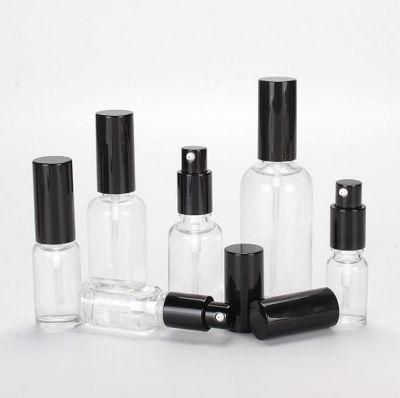 Frosted Round Cosmetic Glass Bottle with Pump Spyayer Seal Cap 50ml 100ml