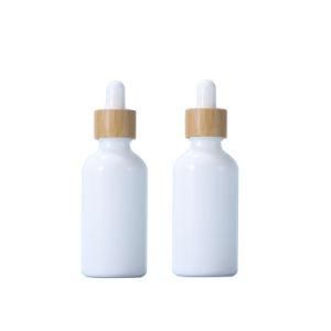 Xuzhou Wholesale White Opal Ceramic Glass Dropper Bottle with Bamboo Cap 10ml 20ml 30ml 50ml 100ml