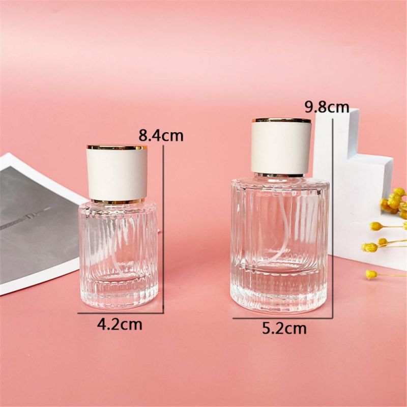 2022 New Design 30ml 50ml Luxury Glass Perfume Bottle Cylinder Shape Clear Spray Glass Screw Bottle