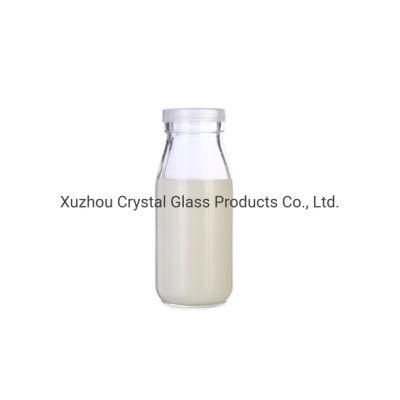 Round Glass Beverage Bottles Food Grade Beverage Milk Glass Container with Lid