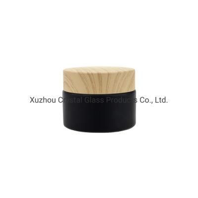 Custom 50g Matte Black Glass Cosmetic Jars Facial Cream Packaging Jar with Dood Grain Lids