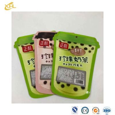 Xiaohuli Package Plastic Drawstring Bags China Supply Resealable Plastic Pouch Moisture Proof Stand up Pouch Bags Use in Food Packaging