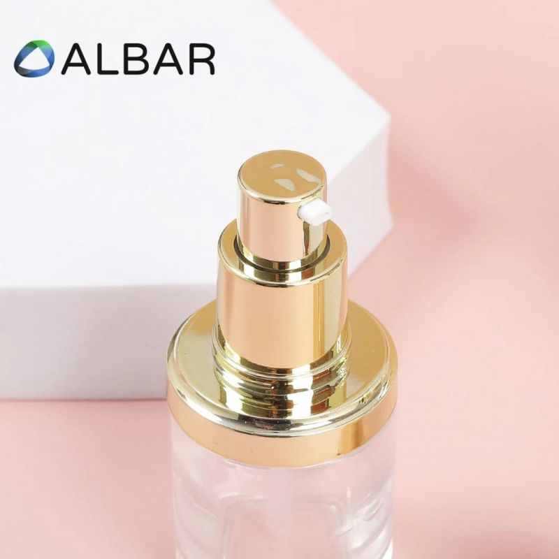 Thick Base Light Gold Fluid Pump Flat Shoulder Short Cylinder Cosmetic Glass Bottles