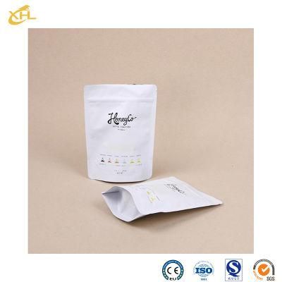 Xiaohuli Package China Commercial Vacuum Packing Bag Manufacturers Zipper Top Tea Packaging Bag for Snack Packaging
