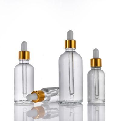 10ml 20ml 30ml 50ml 100ml Transparent Cosmetic Decorative Glass Essential Oil Bottle with Golden Ring Dropper
