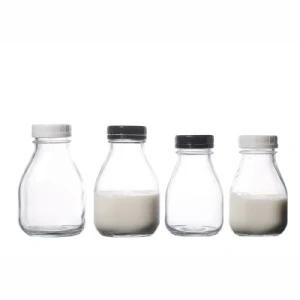 High Quality 350ml 500ml Screw Top Plastic Lids Clear Glass Bottles with Lids Factory