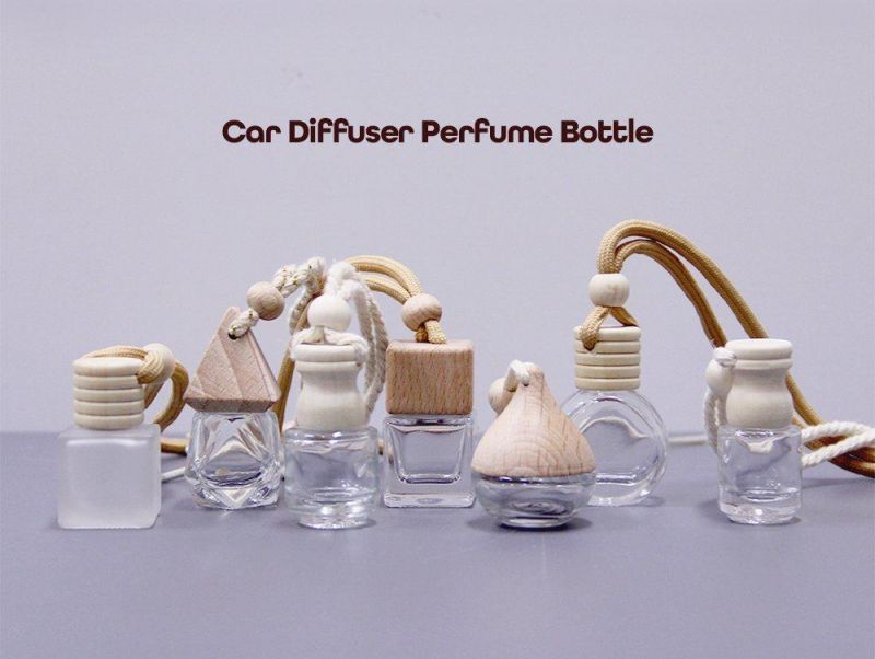 Low MOQ 5ml 6ml 7ml 8ml OEM Car Air Freshener Hanging Glass Perfume Wooden Cover Car Diffuser Bottle