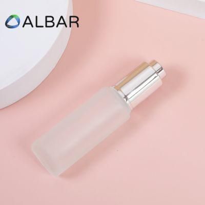 Cylinder Frosted Slim Straight Cosmetics Glass Bottles with Screw Silver Press Pump
