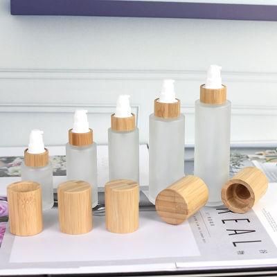 30ml 50ml 60ml 80ml 100ml 120ml Cylinder Shape Glass Frosted Bamboo Lotion Pump Bottle