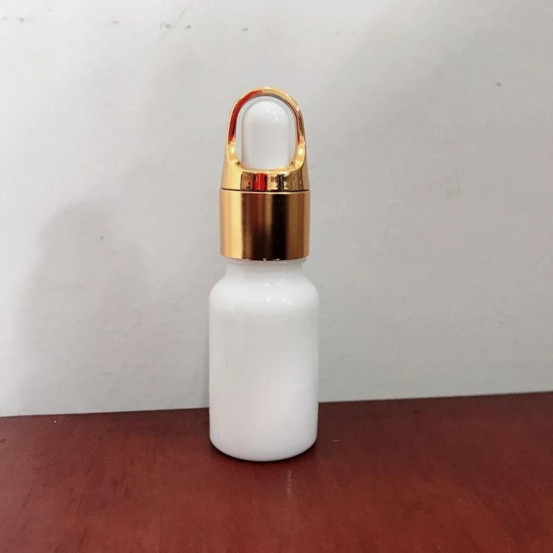 Hot Sale Essential Oil Bottle with UV Plastic Flower-Basket Cover