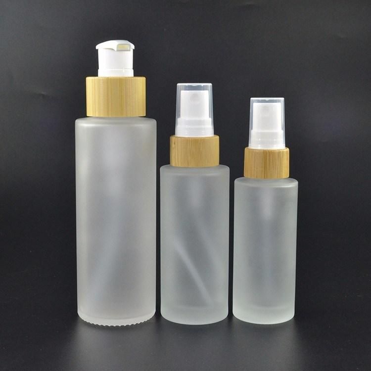 Wholesales Perfume Essential Oil 30ml 50ml 100ml 120ml 150ml Frosted Glass Cosmetic Bottle with Bamboo Spray or Pump Cap