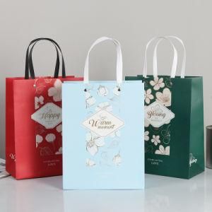 Paper Bag Exquisite Clothing Bag Packaging Bag Wholesale Fashion Shopping Tote Bag Custom Q2021 White Cardboard Tote Bag