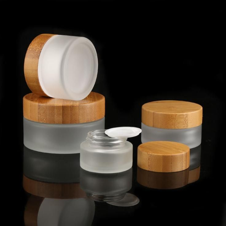 Hot Sale Cosmetic Face Cream Container 5ml 15ml 30ml 50ml 100ml Frosted Clear Glass Cream Jar with Bamboo Wood Cover