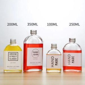 500ml Flat Shape Cold Pressed Juice Glass Bottle Empty Clear Glass Beverage Bottle with Metal Lid