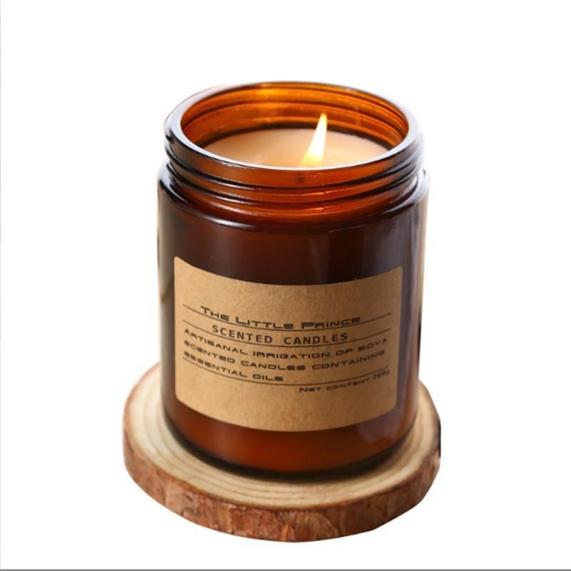 a Glass Can for Holding Candles. a Brown Glass Candlestick with a Lid