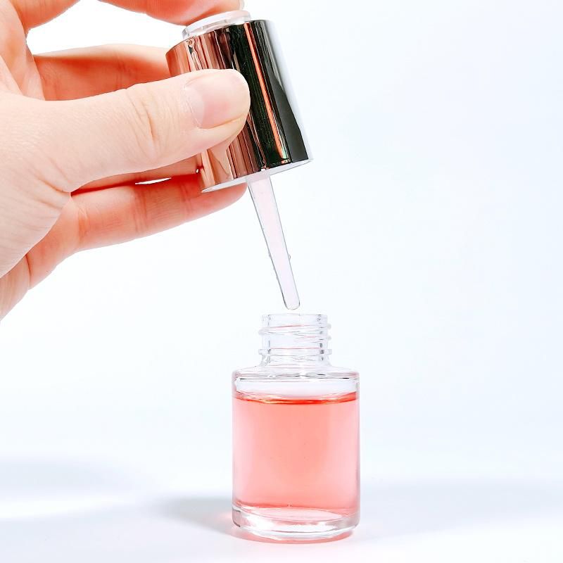 Wholesale Round Clear Glass Rotate Press Squeeze Dropper Eye Essential Oil Bottle 20 Ml for Sale